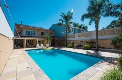 Casa com 4 quartos à venda na avenida saul nonnenmacher, 112, ipanema, porto alegre, 452 m2 por r$ 1.350.000