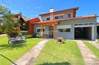 Casa em condomínio fechado com 3 quartos à venda na avenida juca batista, 1200, cavalhada, porto alegre, 250 m2 por r$ 1.700.000