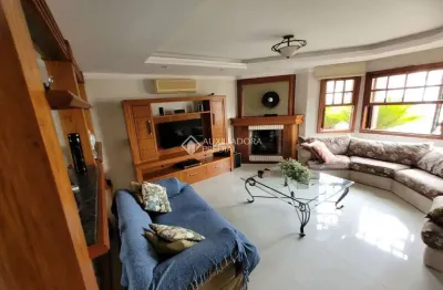 Casa com 3 quartos à venda na rua adão pinheiro da silva, 255, ipanema, porto alegre, 290 m2 por r$ 1.280.000