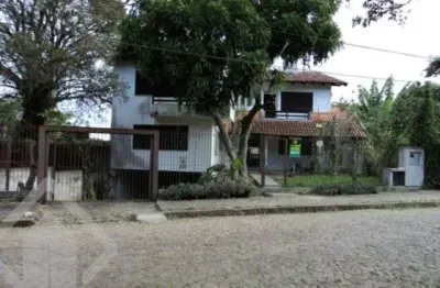 Casa com 4 quartos à venda na rua professor xavier simões, 253, tristeza, porto alegre, 520 m2 por r$ 1.249.000