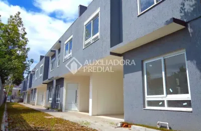 Casa em condomínio fechado com 3 quartos à venda na rua doutor mário totta, 2430, tristeza, porto alegre, 104 m2 por r$ 650.000