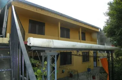 Casa com 3 quartos à venda na avenida monte cristo, 515, vila nova, porto alegre, 330 m2 por r$ 1.290.000