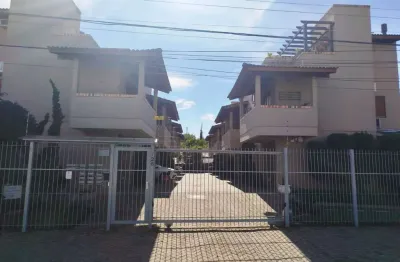 Casa em condomínio fechado com 2 quartos à venda na avenida guarujá, 126, guarujá, porto alegre, 102 m2 por r$ 399.000