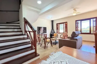 Casa em condomínio fechado com 4 quartos à venda na rua monte arraes, 210, nonoai, porto alegre, 317 m2 por r$ 954.000