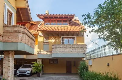 Casa em condomínio fechado com 3 quartos à venda na avenida coronel marcos, 2171, pedra redonda, porto alegre, 171 m2 por r$ 750.000