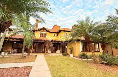Casa em condomínio fechado com 3 quartos à venda na avenida juca batista, 8000, belém novo, porto alegre, 350 m2 por r$ 2.750.000