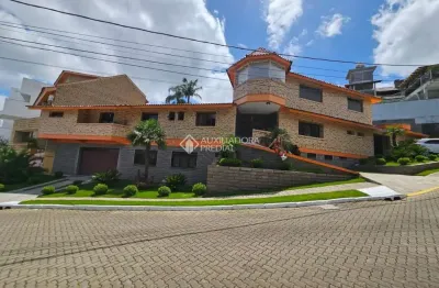 Casa em condomínio fechado com 3 quartos à venda na rua alcebíades antônio dos santos, 605, nonoai, porto alegre, 400 m2 por r$ 1.691.000