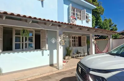 Casa com 4 quartos à venda na avenida josé corrêa da silva, 547, cavalhada, porto alegre, 162 m2 por r$ 570.000
