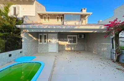 Casa em condomínio fechado com 3 quartos à venda na rua guatambu, 218, hípica, porto alegre, 141 m2 por r$ 690.000