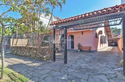 Casa com 3 quartos à venda na rua folha da tarde, 214, cristal, porto alegre, 174 m2 por r$ 1.080.000