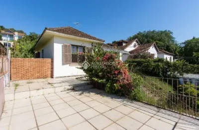 Casa com 3 quartos à venda na Rua Oscar Tollens, 242, Santa Tereza, Porto Alegre, 160 m2 por R$ 500.000