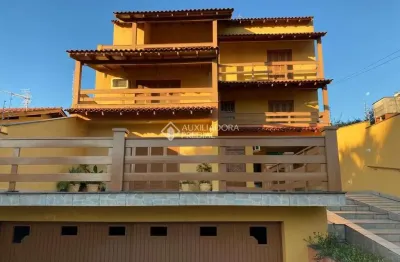 Casa com 4 quartos à venda na rua vinte e quatro de agosto, 1200, centro, esteio, 563 m2 por r$ 1.700.000