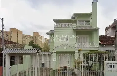 Casa com 5 quartos à venda na Rua Folha da Tarde, 49, Cristal, Porto Alegre, 330 m2 por R$ 1.590.000