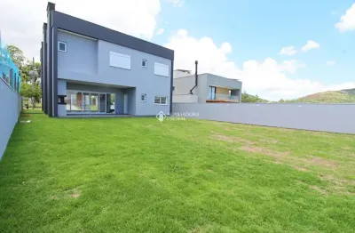 Casa em condomínio fechado com 4 quartos à venda na estrada das três meninas, 1501, vila nova, porto alegre, 294 m2 por r$ 2.490.000
