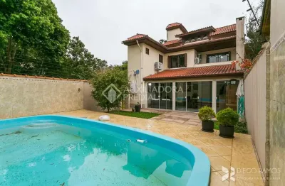 Casa em condomínio fechado com 3 quartos à venda na rua cassino, 75, ipanema, porto alegre, 379 m2 por r$ 980.000