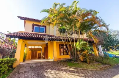 Casa em condomínio fechado com 3 quartos à venda na rua luís felipe monmany, 101, espírito santo, porto alegre, 132 m2 por r$ 550.000