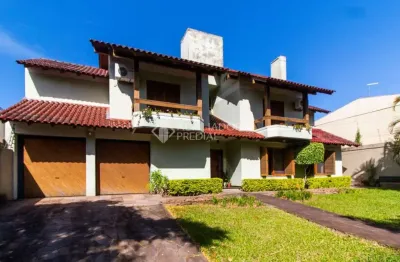 Casa em condomínio fechado com 3 quartos à venda na travessa nova trento, 354, tristeza, porto alegre, 430 m2 por r$ 1.400.000