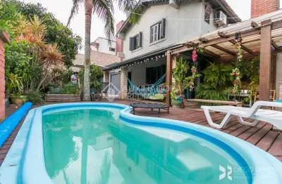Casa em condomínio fechado com 3 quartos à venda na estrada joão passuelo, 1060, vila nova, porto alegre, 230 m2 por r$ 520.000