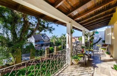 Casa com 3 quartos à venda na rua padre joão batista reus, 1477, vila conceição, porto alegre, 260 m2 por r$ 1.250.000
