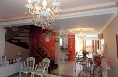 Casa em condomínio fechado com 2 quartos à venda na avenida edgar pires de castro, 1286, hípica, porto alegre, 212 m2 por r$ 505.000