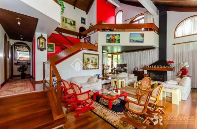 Casa com 4 quartos à venda na rua guato, 131, vila assunção, porto alegre, 456 m2 por r$ 2.700.000