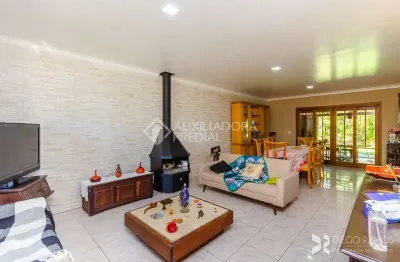 Casa com 4 quartos à venda na rua landel de moura, 111, tristeza, porto alegre, 360 m2 por r$ 1.150.000