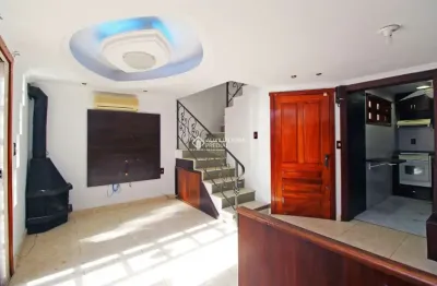 Casa em condomínio fechado com 3 quartos à venda na avenida wenceslau escobar, 3714, tristeza, porto alegre, 167 m2 por r$ 560.000