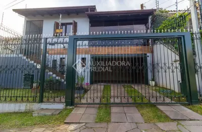 Casa com 3 quartos à venda na rua doutor egydio michaelsen, 250, cavalhada, porto alegre, 292 m2 por r$ 960.000