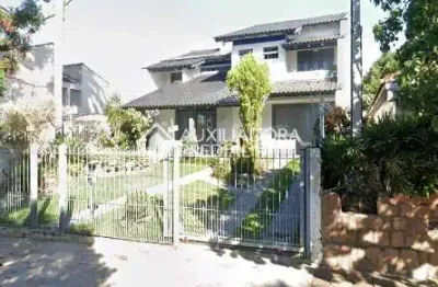 Casa com 5 quartos à venda na rua doutor mário totta, 2087, tristeza, porto alegre, 379 m2 por r$ 1.790.000