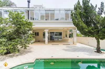 Casa com 5 quartos à venda na rua das tibiras, 241, jurerê internacional, florianópolis, 365 m2 por r$ 5.500.000