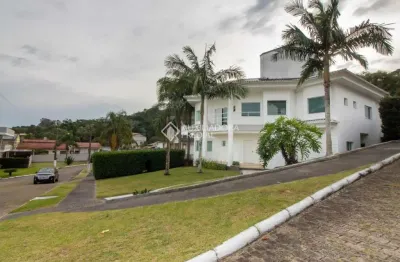 Casa em condomínio fechado com 4 quartos à venda na rodovia haroldo soares glavan, 929, cacupé, florianópolis, 484 m2 por r$ 3.700.000
