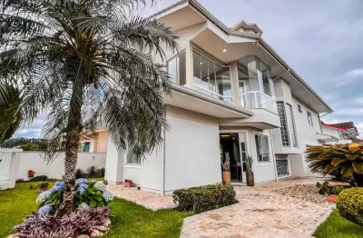 Casa com 4 quartos à venda na rua varese, 83, pagani, palhoça, 248 m2 por r$ 2.100.000