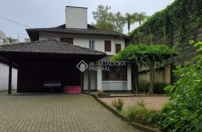 Casa com 4 quartos à venda na rodovia haroldo soares glavan, 350, cacupé, florianópolis, 216 m2 por r$ 2.199.000
