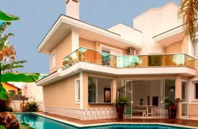 Casa com 4 quartos à venda na rua dos aruanãs, 81, jurerê internacional, florianópolis, 374 m2 por r$ 8.500.000