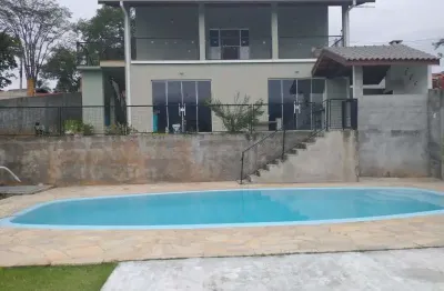 Casa  Atibaia SP.  2 dormitórios sendo 1 suíte,  sala ampla, cozinha americana,  salão de festas,  churrasqueira,  piscina,  vista para Pedro Grande.