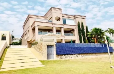 Magnífica casa em condomínio na Vila Santista, Atibaia-SP: 4 quartos, 3 suítes, 3 salas, 7 banheiros, 6 vagas de garagem, 700m².