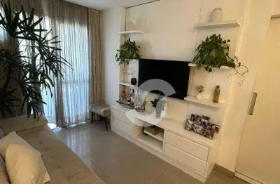 Venha morar num gran village de 2 quartos com uma suite e vaga de garagem