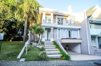 Casa em condomínio semimobiliada para alugar no Campo Comprido com 4 quartos