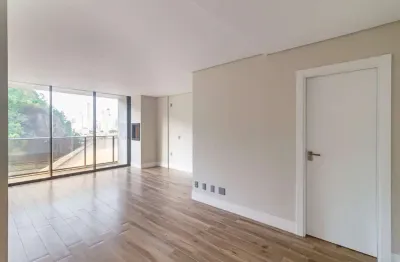 Apartamento em frente ao balneário shopping à venda com 02 suítes.