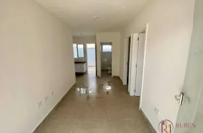 Village com 2 dormitórios à venda por R$ 550.000,00 - Centro - Bertioga/SP