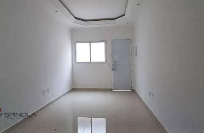Casa com 2 dormitórios à venda, 60 m² por r$ 340.000,00 - tude basto - praia grande/sp