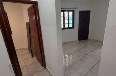 Casa com 2 dormitórios à venda, 136 m² por R$ 750.000,00 - Caiçara - Praia Grande/SP