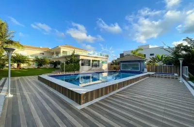 Casa Sobrado à venda com piscina, 5 quarto(s),  sendo 5 suíte(s)  no bairro Bougainville Residencial IV, 1000 metros da praia, Peruíbe-SP