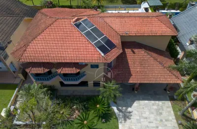 Casa Sobrado à venda com piscina, 5 quarto(s),  sendo 5 suíte(s)  no bairro Bougainville Residencial III, 800 metros da praia, Peruíbe-SP