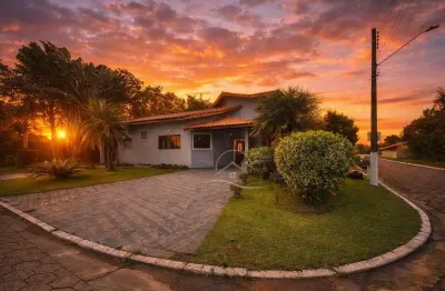 Casa Térrea à venda com piscina, 5 quarto(s),  sendo 5 suíte(s)  no bairro Bougainville Residencial V, 2 metros da praia, Peruíbe-SP