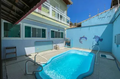 Casa Sobrado à venda com piscina, 4 quarto(s),  sendo 4 suíte(s)  no bairro Oasis, 500 metros da praia, Peruíbe-SP