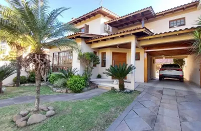 Casa à venda por r$1.400.000,00, 296,00m² - dom feliciano - gravataí, rs