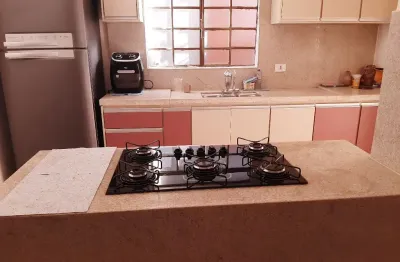 Linda casa bairro alvorada 3/4, piso porcelanato, cozinha planejada