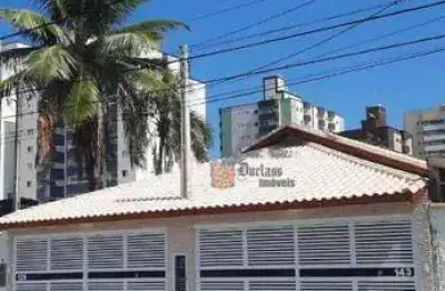 Casa com 2 dormitórios à venda, 110 m² por r$ 585.000,00 - maracanã - praia grande/sp