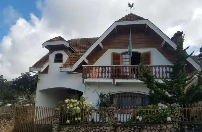 Sobrado com 3 dormitórios à venda, 206 m² por r$ 1.150.000 - j jaguaribe - campos do jordão/sp